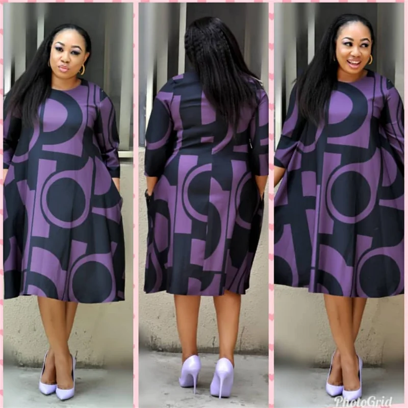 

Женское платье с круглым вырезом, коротким рукавом и юбкой средней длины