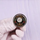 Брошь с кабошоном, стеклянная, с эмблемой, с изображением внешнего мира