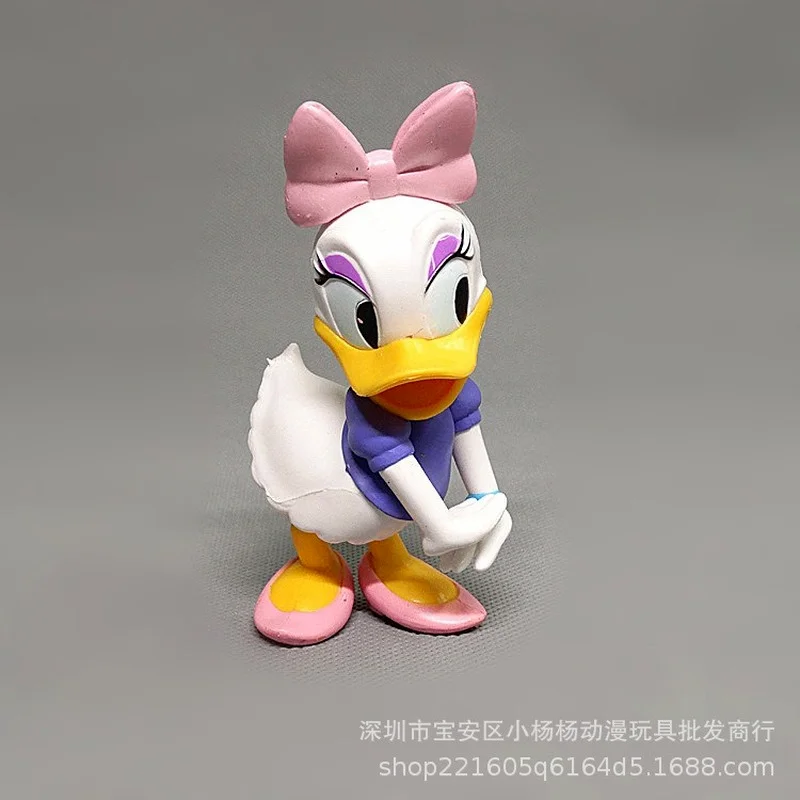 

Disney Action Figure Duck and Daisy Toy 12CM One Set of 2 Pcs Classic Cartoon Car decoration Donald Duck and Daisy Dolls
