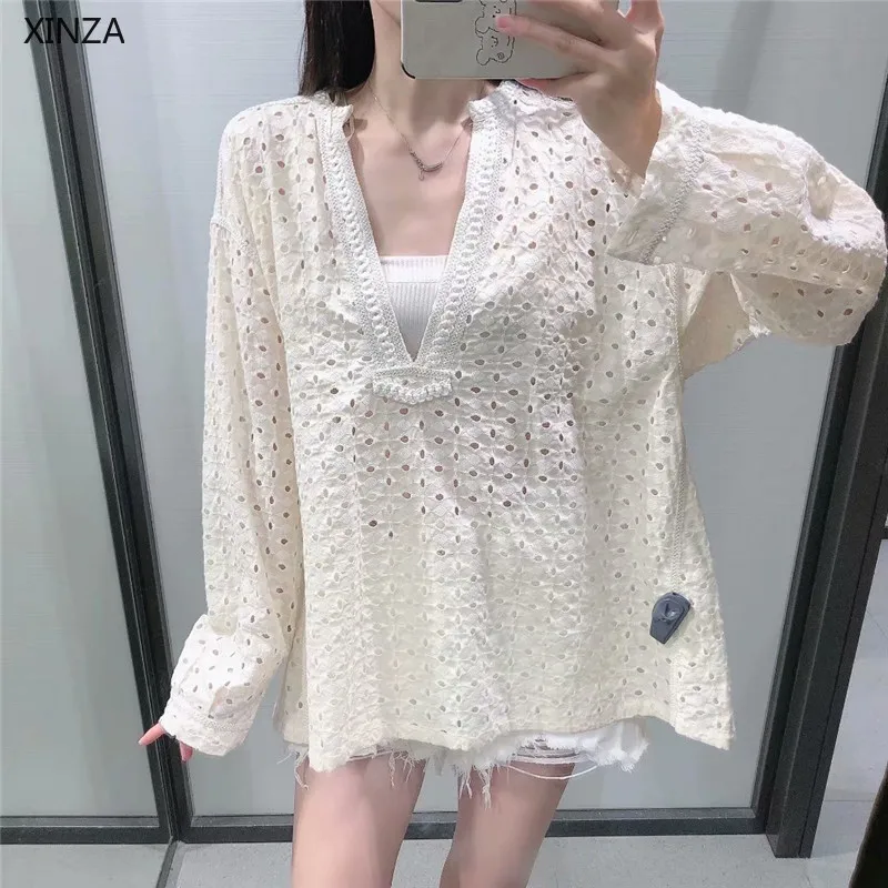 

2021 ZA Women Summer Openwork Embroidered Blouse Long Sleeve V Neck Vintage Blouses Female Fashion Irregular Hem Casual Top