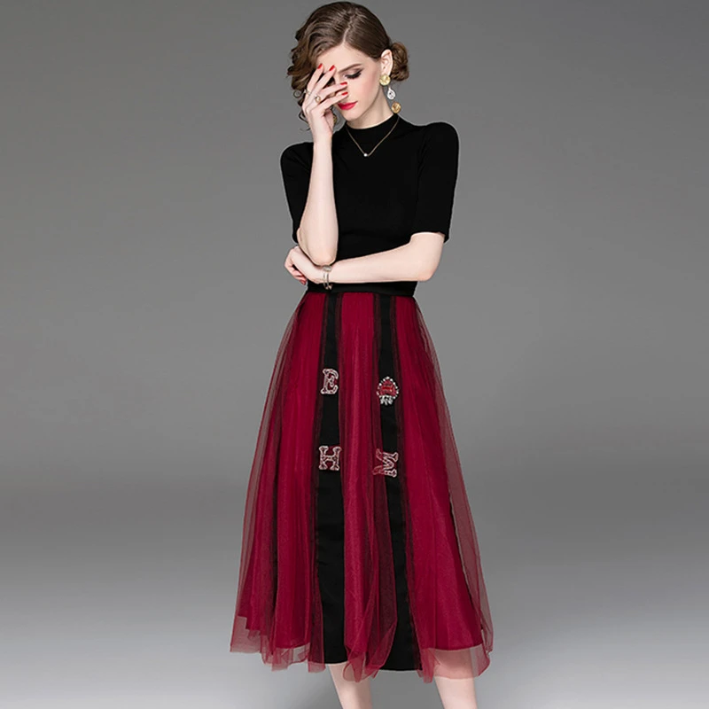 

Women's suit skirt set spring new best short-sleeved round-neck knitted half-sleeved shirt with net splicing skirt 2 sets