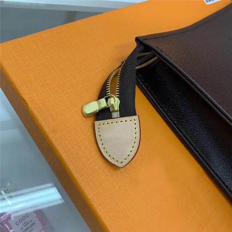 

Fashion genuine leather brown clutch flowers best quality man / woman zipper clutch bag large capacity top quality bag