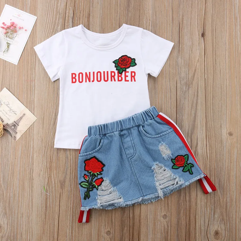 

Fashion New Toddler Kids Girl Summer Clothes Short Sleeve Floral T-shirt Tops+Embroider Rose Flower Hole Denim Skirt 2PCS Set