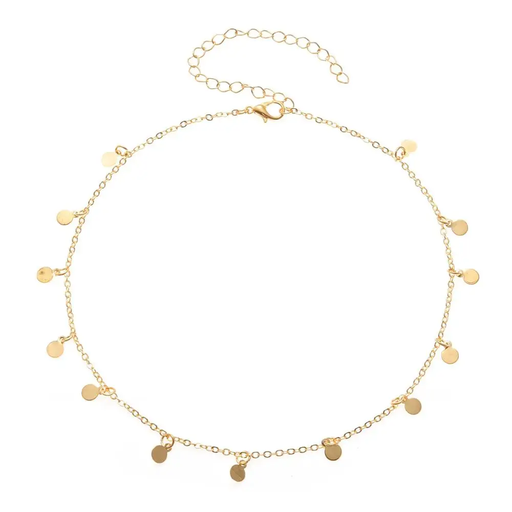 Женское колье чокер золотистого цвета с блестками монетами и кисточками