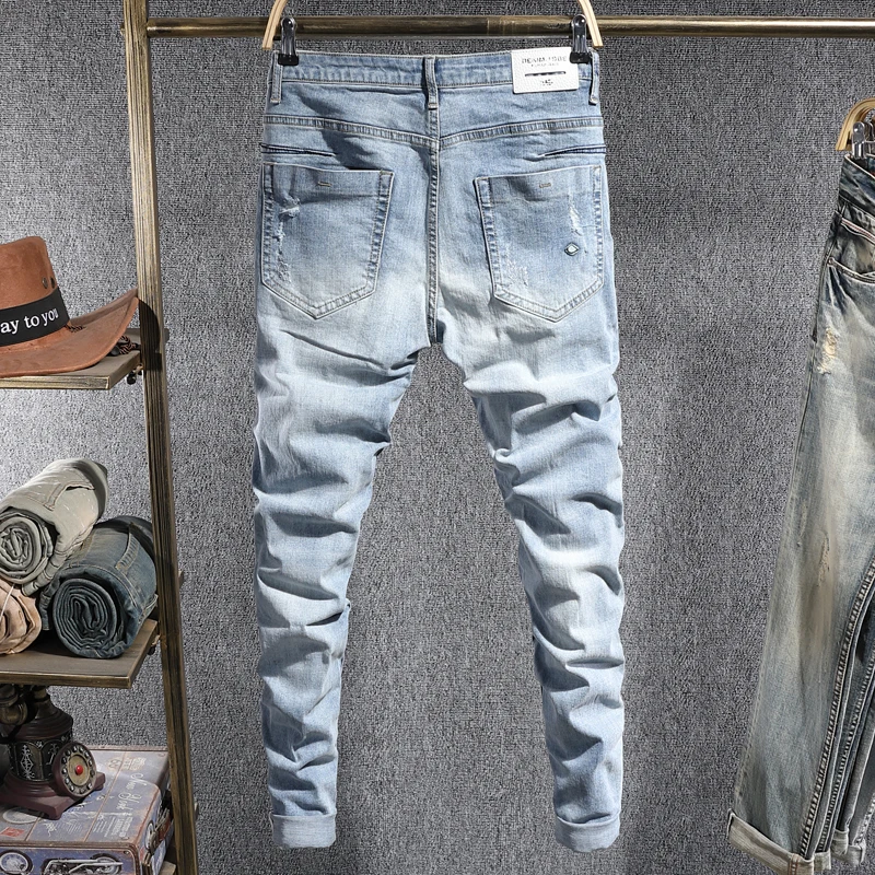 Korean Style Men Jeans Retro Light Blue Elastic Slim Ripped Jeans Men Street Fashion Patched Designer Casual Denim Pencil Pants