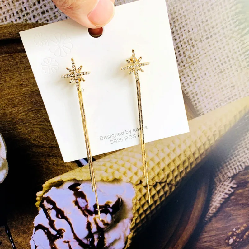 

Eight star tassel two earrings 2021 new 925 silver needle personalized versatile net red Earrings show face thin Earrings