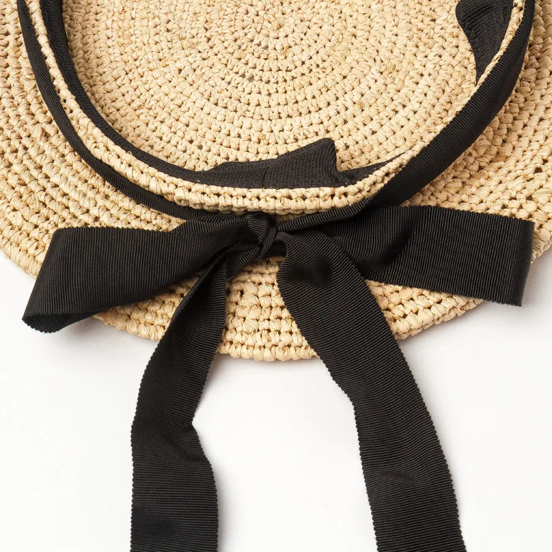 

New Hand-woven Ribbon Bow-tie Rafayegrass Beret Fashionable Leisure Straw Bud Cap in Spring and Summer in Europe and America