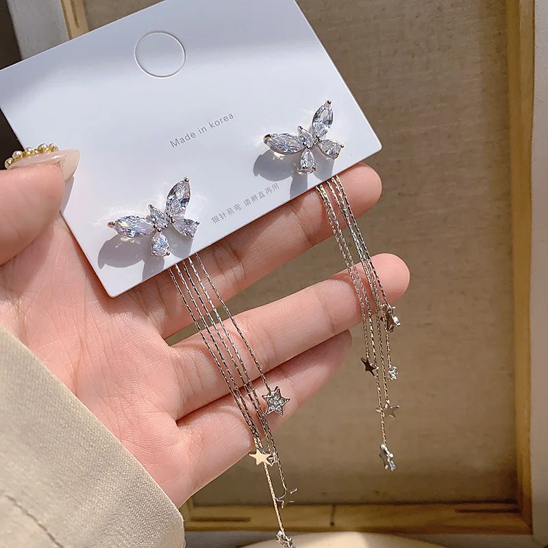 

Korean version of the new super fairy zircon butterfly tassel earrings female fashion personality S925 silver needle earrings