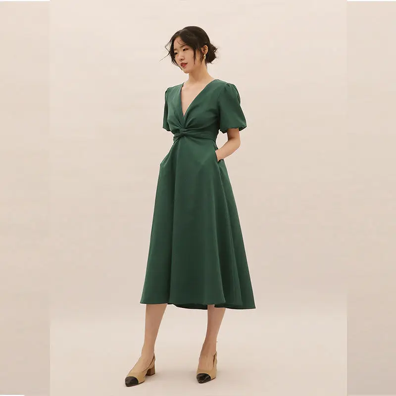 

2021 summer new slim dress waist short sleeve chest bandage kink V-neck over knee mid length skirt