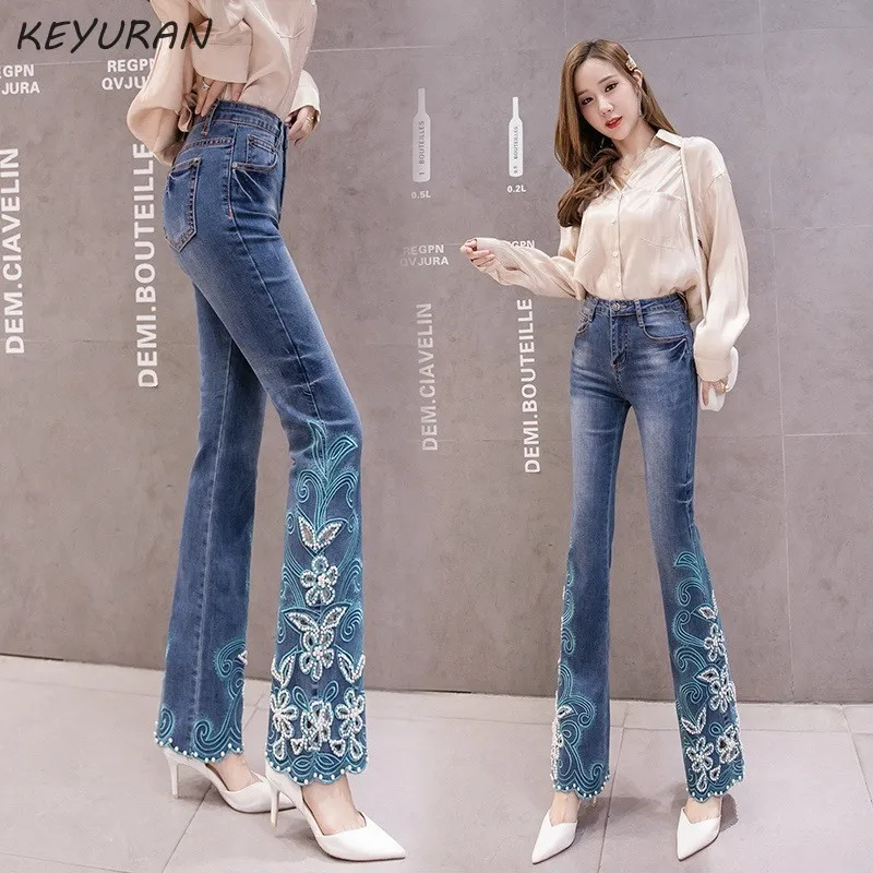 Выдалбливают Бисер цветочной вышивкой синие джинсы с высокой талией