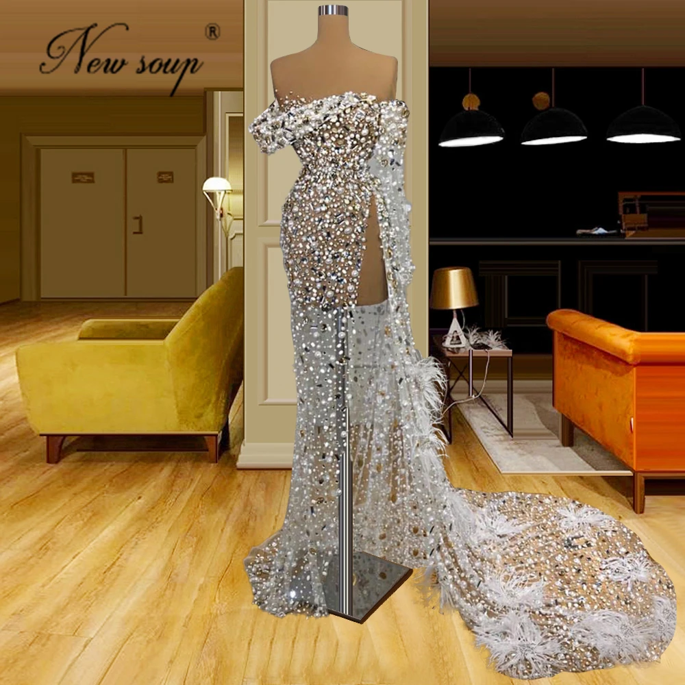 

Arabic Dubai Full Beaded Evening Dresses Ivory Feathers Vestidos De Fiesta Party Dress Pearls Illusion Prom Long Celebrity Dress