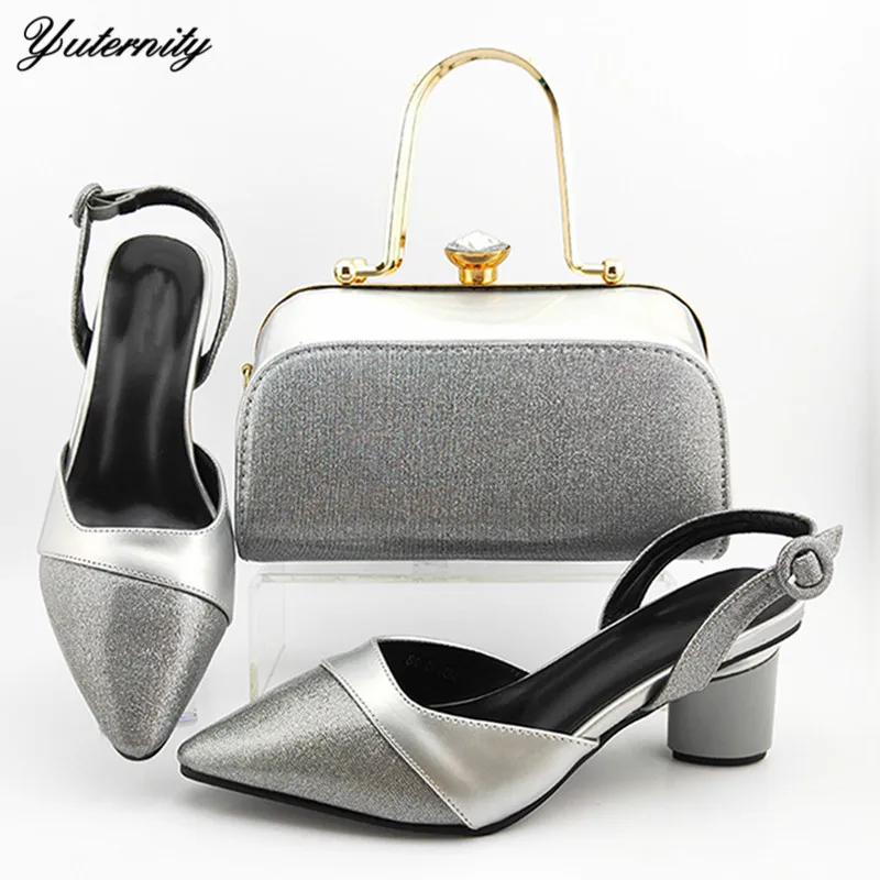 Комплект из вечерних туфель и сумочки в африканском стиле сезон весна осень