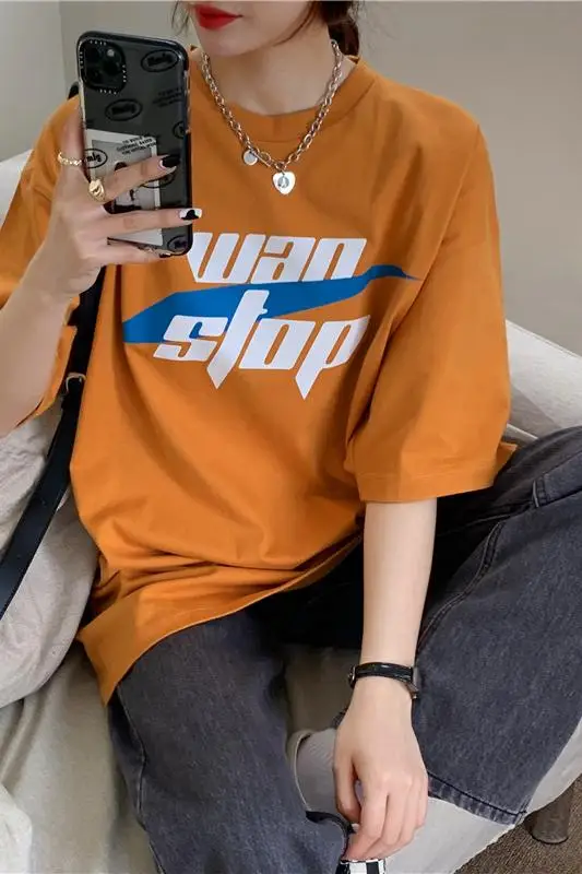

New Korean version of the T-shirt round neck loose large size cartoon letter printing mid-length short-sleeved T-shirt women