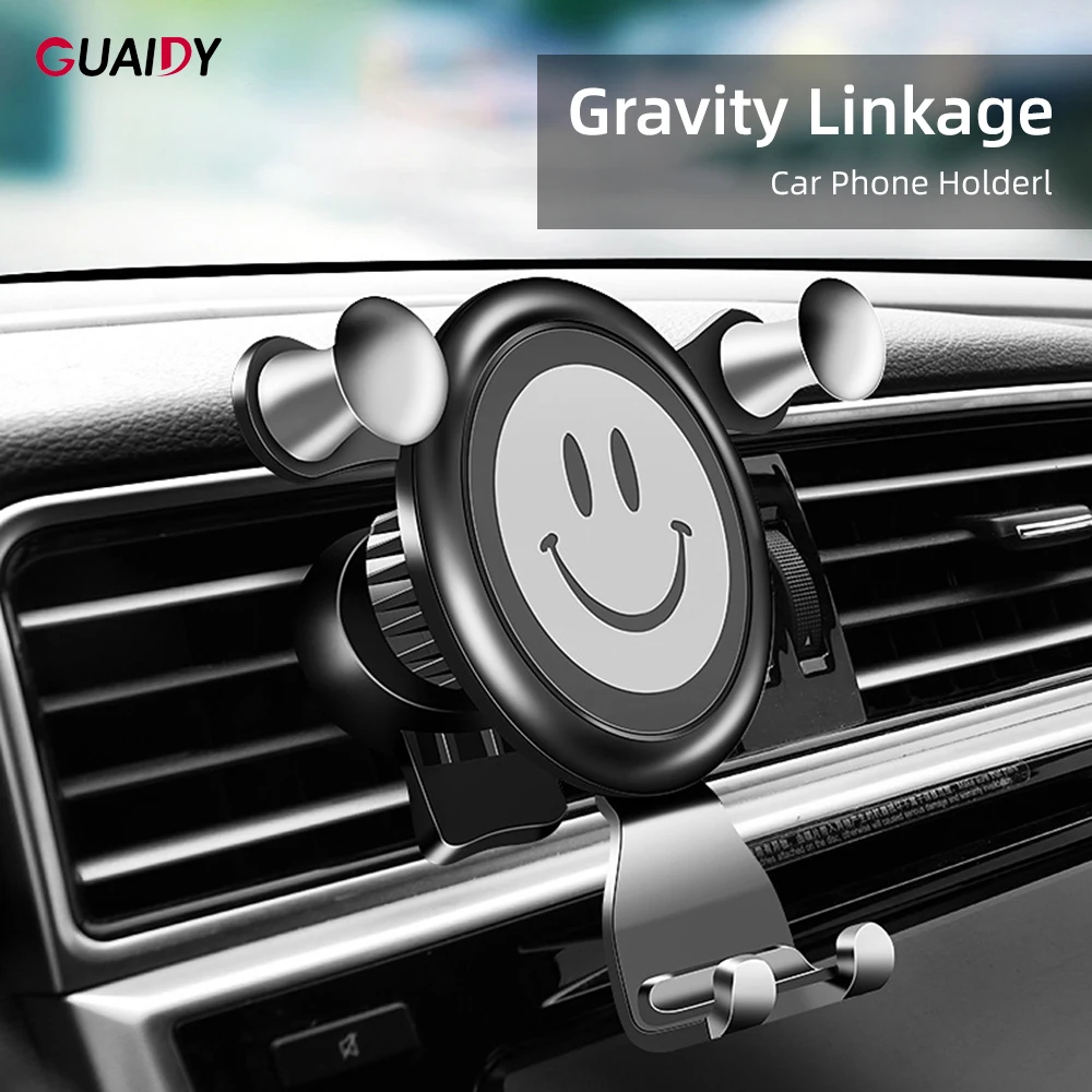 Автодержатель для телефона в машине с улыбкой узор, треугольным креплением на воздушный выход, свободным вращением, регулировкой, защитой, универсальной гравитацией.