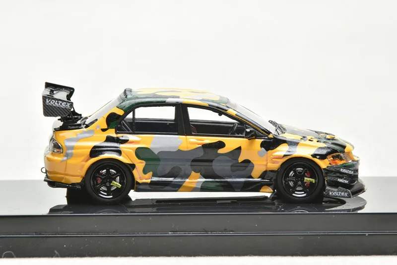 

Модель автомобиля из смолы Mitsubishi Evolution IX Voltex, модель 1:64, 404