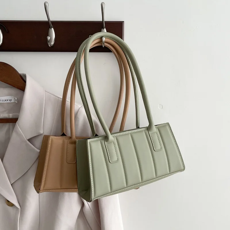 

Brand Ladies Fashion Simple Light Luxury Style Striped Shoulder Handbag Baguette Bag Shopping Cosmetics Mobile Phone Coin Purse