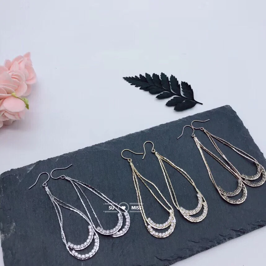 

Free Shipping Korean version of popular fashion jewelry elegant Crystal earrings simple chain long earrings for women