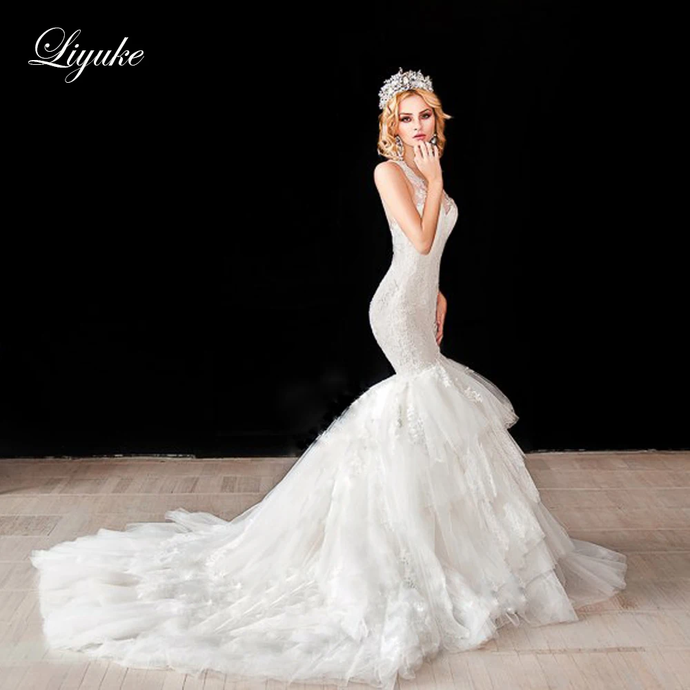 

Liyuke Mermaid Wedding Dress 2020 With Puffy Lace Skirt Buttons Closure vestido de noiva