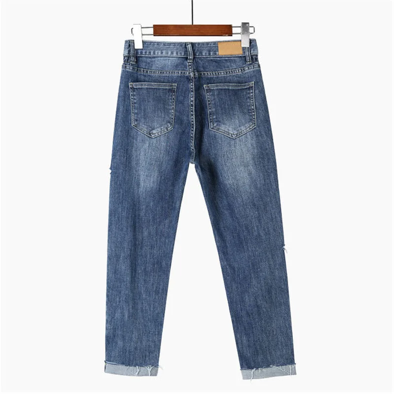 Женские штаны шаровары Джинсовые весенние рваные Отбеленные джинсовые брюки с