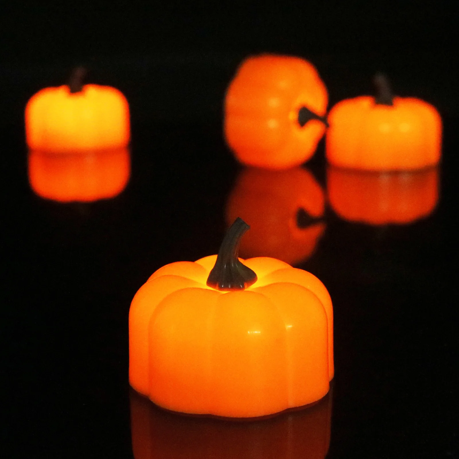 

Flickering Pumpkin Tea Lights 12 Pack Flickering LED Pumpkin Lights with Battery Flameless Pumpkin Candles Light for Halloween