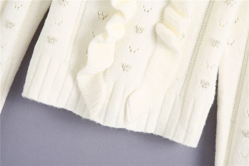 

Elegant women white sweater pullover 2020 fashion ladies ruffles pearl sweater sweet female streetwear hollow out girls chic top