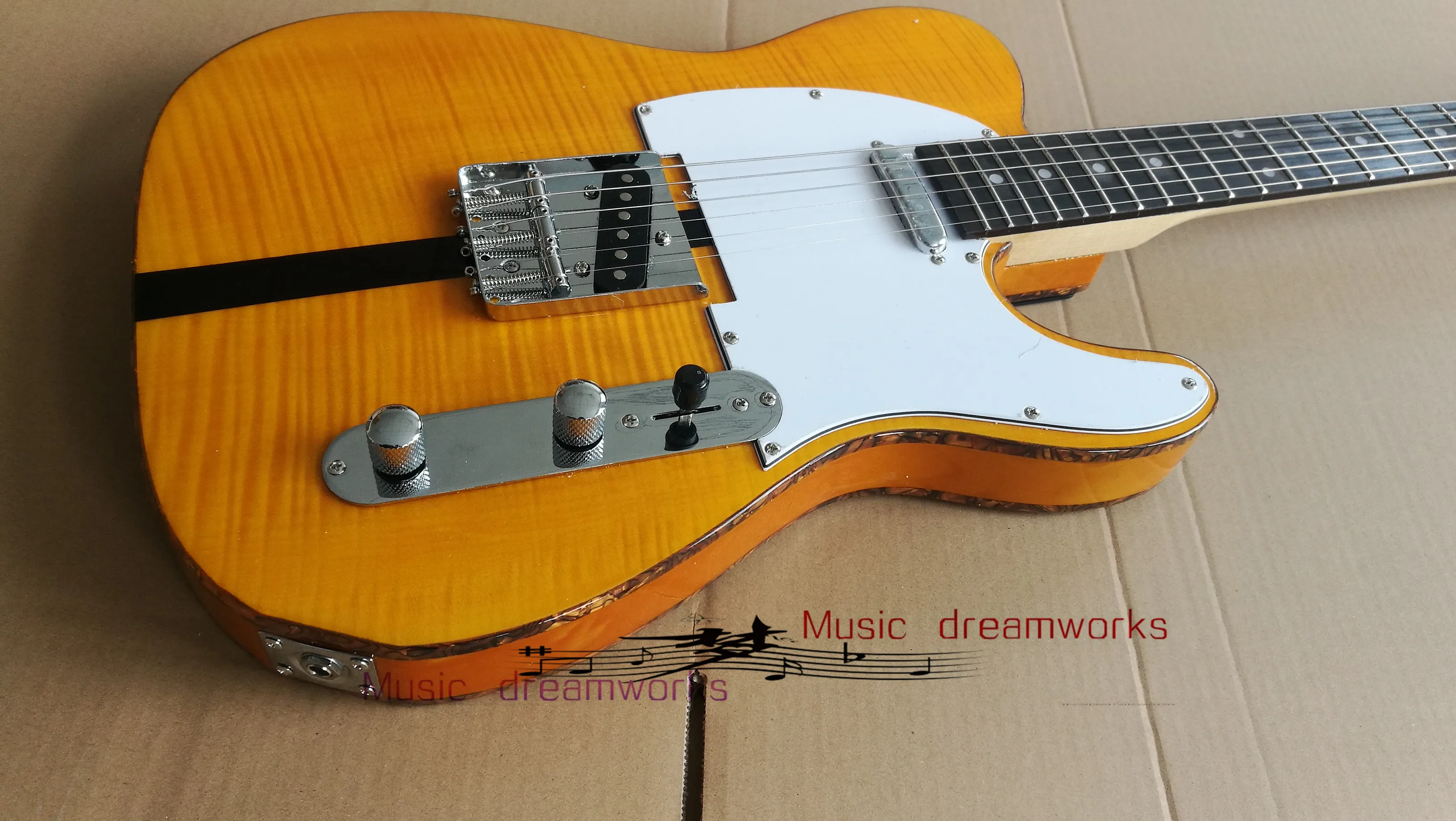 

China Becoda OEM shop Electric Guitar T1L2 electric guitar.Body double flame maple wood The color can be customized