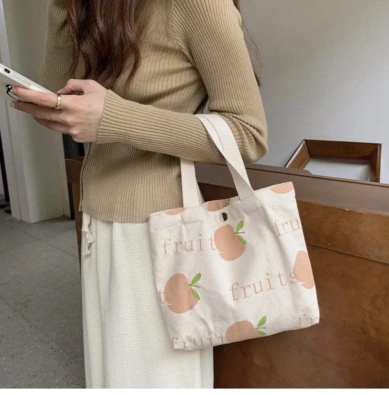

Storage Bag Fashion Canvas Peach Lovely Shopping Bag Mini Handbag Bag Japan Style Small Fresh Bento Bag Easy To Clean Portable