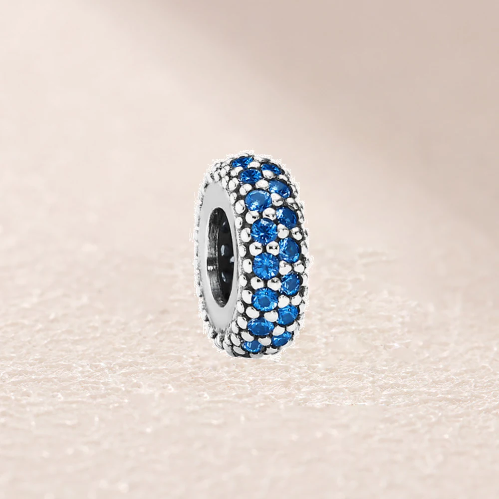 

791359NCB PAVE INSPIRATION BLUE ZIRCONIA & SILVER SPACER -