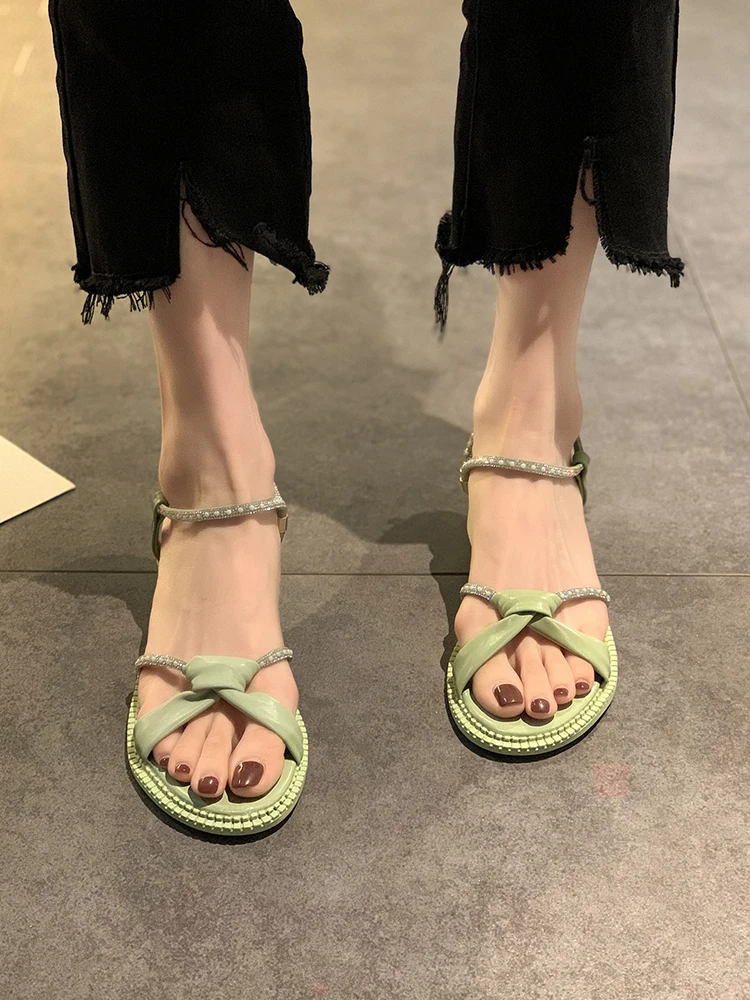 

Thick heel sandals women 2021 summer new fashion wild rhinestone fairy style word buckle Roman shoes tide