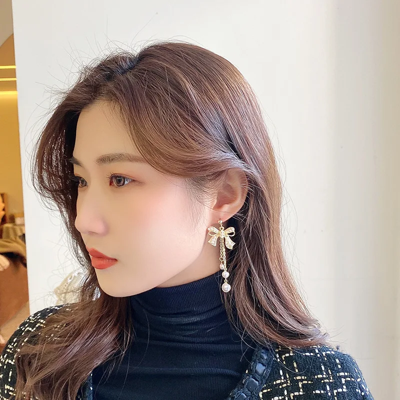 

2021 New Super Fairy Butterfly Earrings Silver Needle Temperament Pearl Tassel Personality Ladies Long Fashion Earrings Women