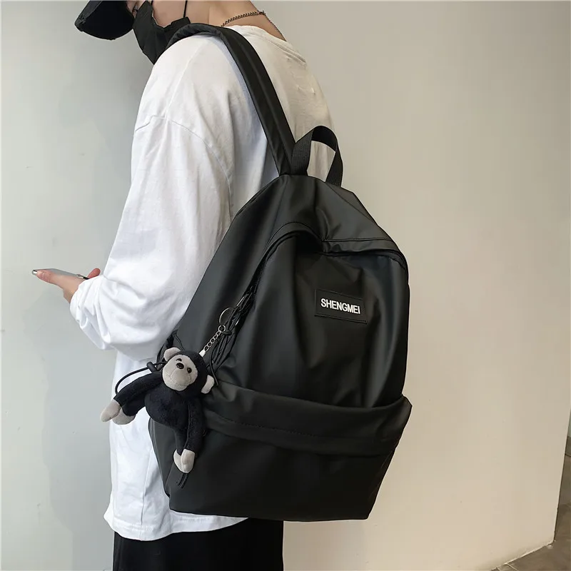 

Fashion Solid Color High Value Schoolbag School Bags For Teenage Girls College Students Mochila Laptop Backpack Men With Pendant