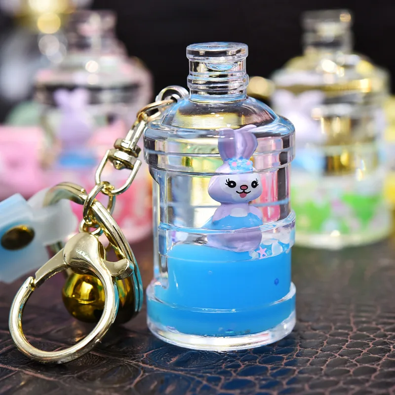 

Net Celebrity Doll Into Oil Star Dew Bucket Keychain Acrylic Transparent Water Bottle Key Ring Doll Machine Small Gift Bag Pend