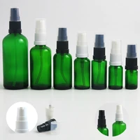 15pcs 10ml 20ml 30ml 50ml 100ml green glass bottle with white black plastic pump 5cc 15cc small cosmetic skincare bottle