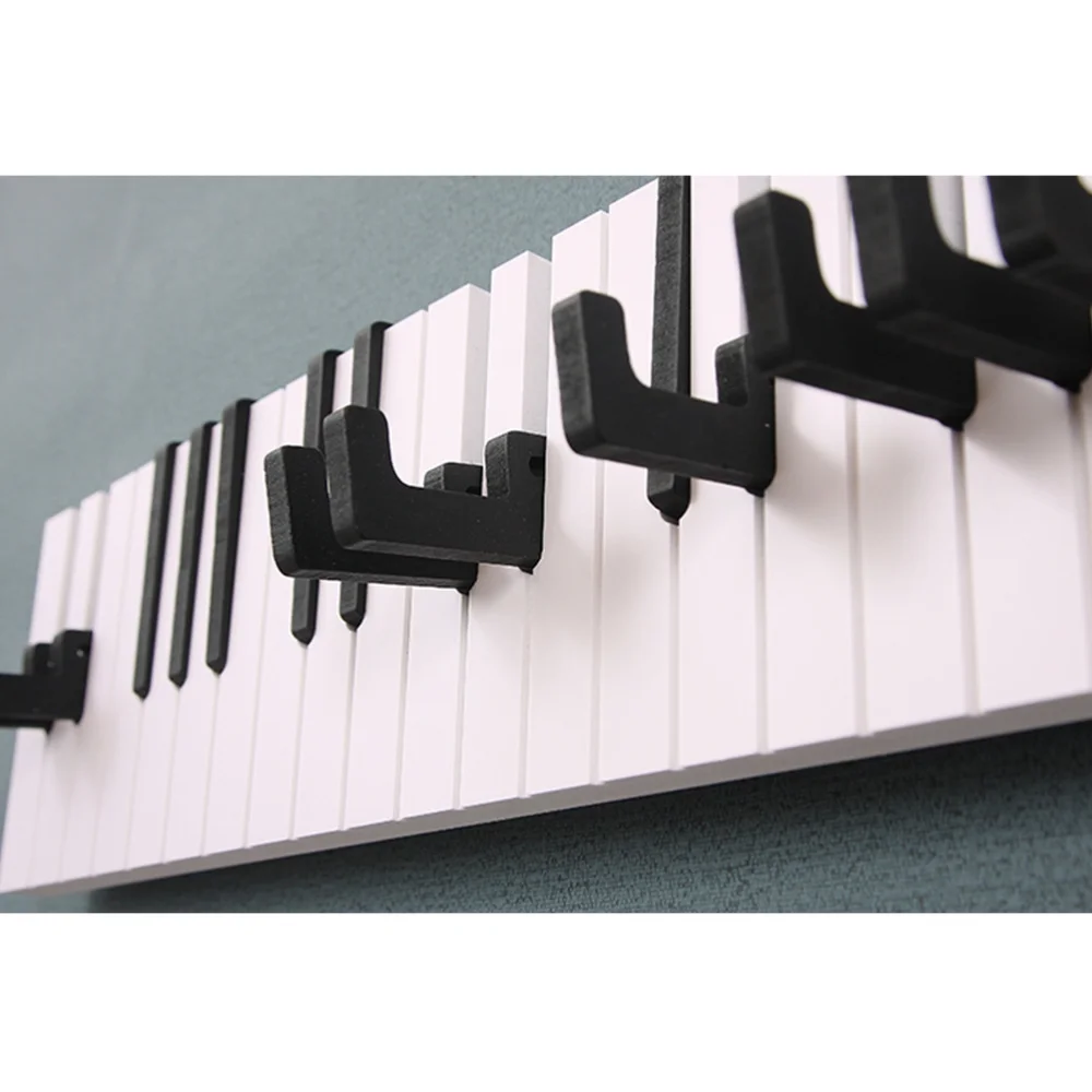 

Wall-mounted Coat Hanger with 16 Piano Keys Hooks Multifunction Practical Coatrack for Bedroom Living Room Bathroom (Black)