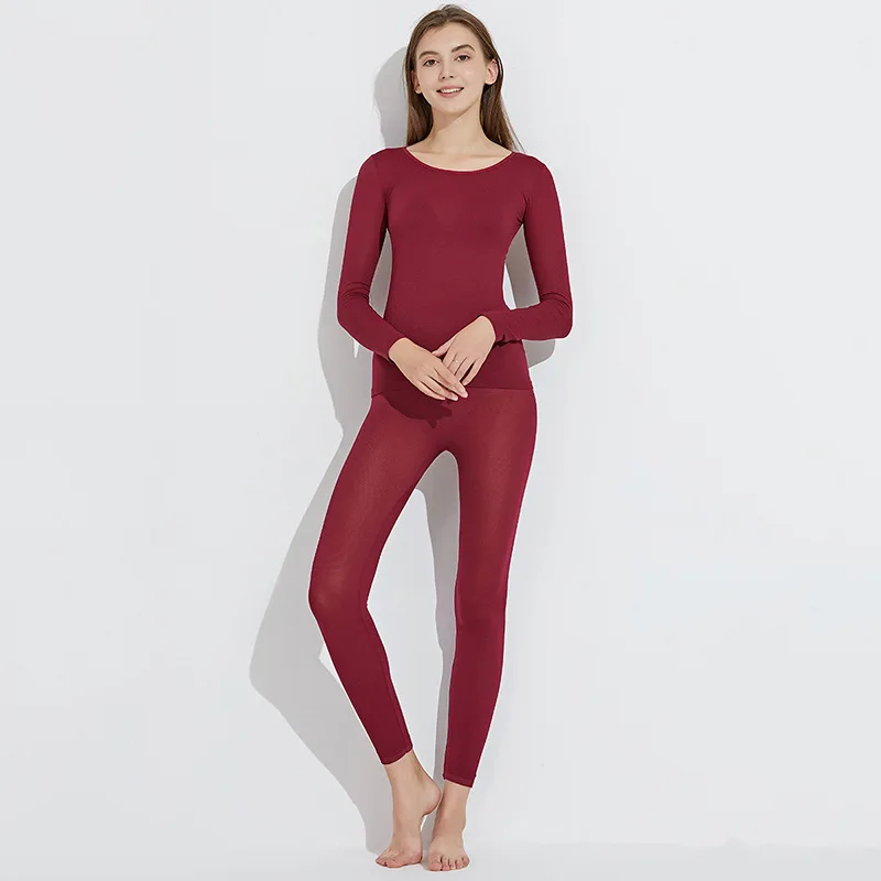 

Thermal underwear women's ultra-thin high-elastic self-cultivation body heating long trousers men and women couples suit