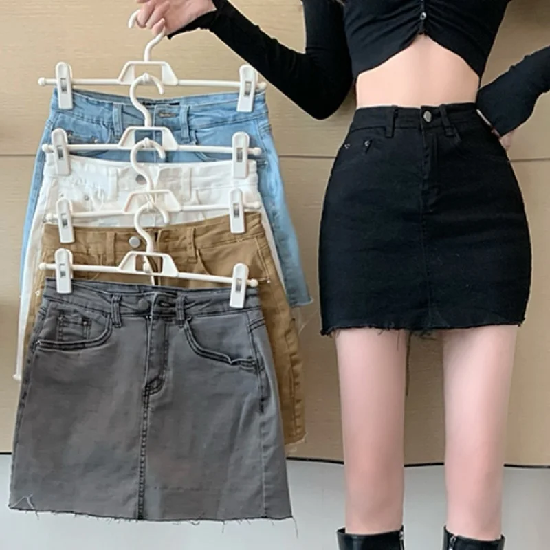 

Retro Hong Kong-flavored denim skirt female 2021 early spring new high-waist slim short skirt covering crotch hip skirt
