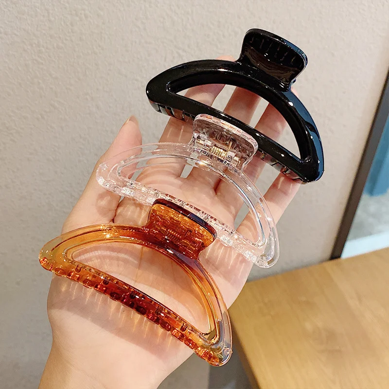 

Women Elegant Amber Geometric Hollow Hair Claws Ladies Elegant Transparent Amber Geometric Headband Hair Clip Holder