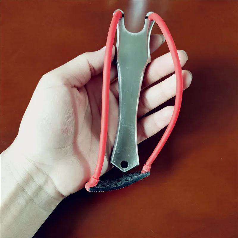 

New high-quality stainless steel fish shoot slingshot powerful catapult with rubber band adult outdoor sling shooting 2020