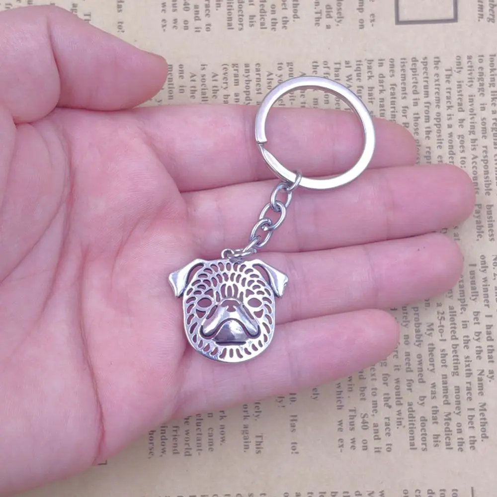 Брелок в виде собаки гриффона стиле милитари брелок ручной работы с кисточками