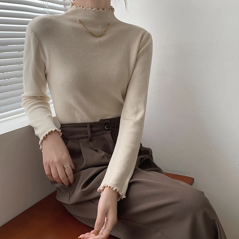 

Женский свитер с воротником-хомутом и капюшоном