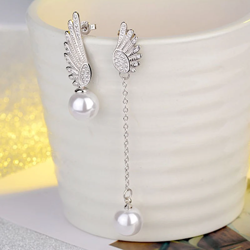 Женские серьги-гвоздики из серебра 925 пробы с двумя ангельскими крыльями |