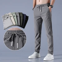 summer thin ice silk quick dry pants youth men straight stretch loose thin breathable casual sports trousers elastic waist