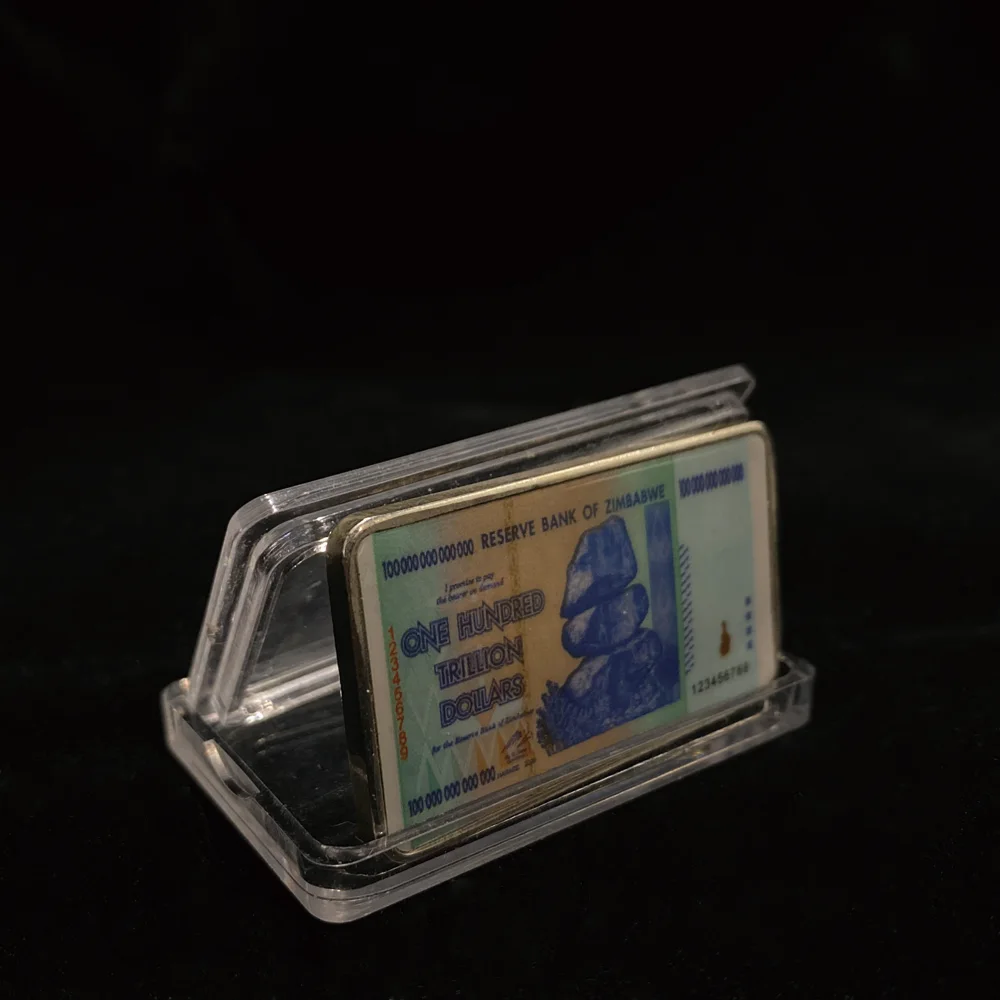 Памятные монеты Зимбабве 100 триллиантов долларов серебряные слитки