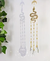 floral serpent snake crystal prism hanging suncatcher gold plated crystal prism wall hanging cyrus suncatcher