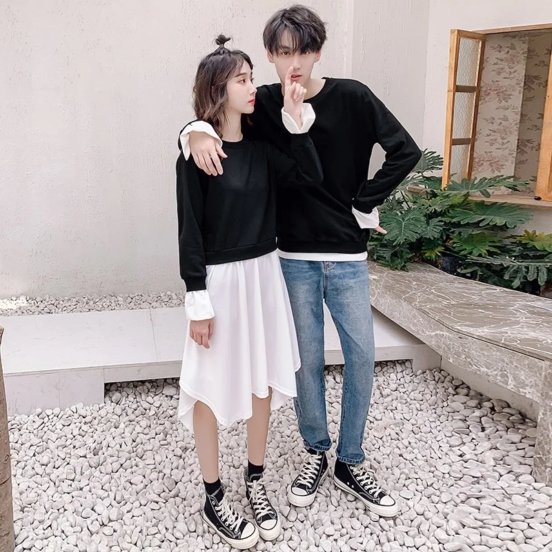 

Two women's black and white dress and men's long sleeve sweater