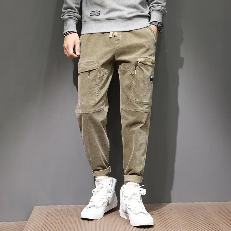 

Newly Designer Fashion Men Jeans Korean Style Loose Fit Casual Corduroy Cargo Pants Streetwear Hip Hop Wide Leg Harem Trousers