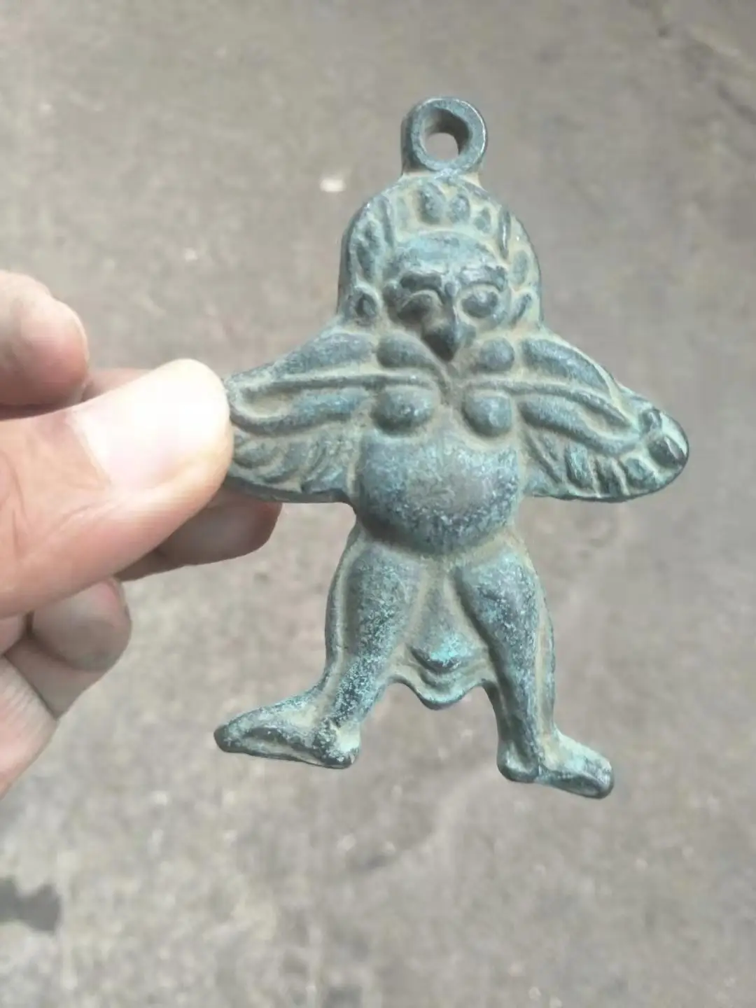 

Династия Хань, национальная бронзовая подвеска с изображением сына бога грома