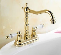 golden brass swivel spout 2 hole mount bathroom basin faucet dual ceramic handles vessel sink mixer tap tnf322