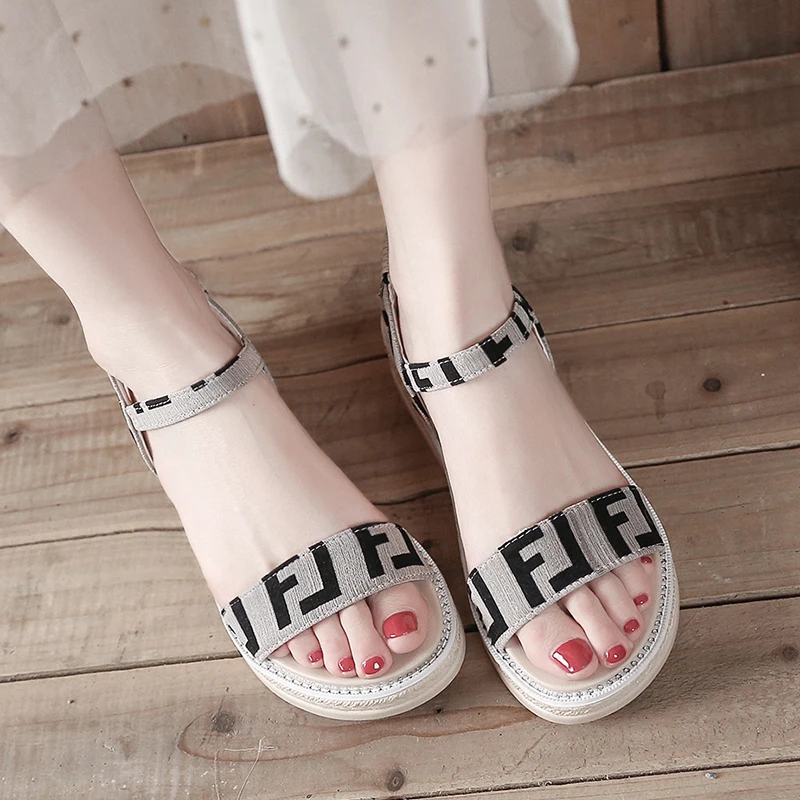 

Sandals women 2020 summer new wedge heels simple sandals thick bottom sponge cake open toe buckle letter shoes Z594