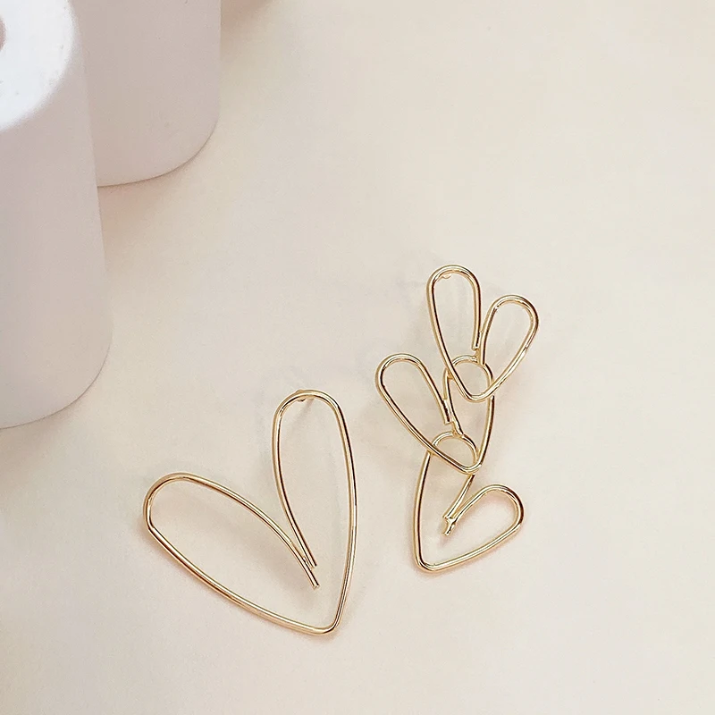 Асимметричные серьги с полыми сердечками корейские темпераментные простые